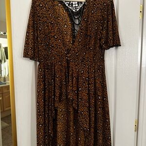 Long open in front & long in the back.mustard w black dress/ high/low size XL